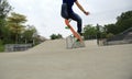 Young skateboarder practice ollie trick