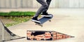 Young skateboarder practicing in the skate park. Royalty Free Stock Photo