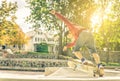 Young skateboarder practicing in the skate park