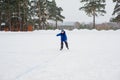 Young skater boy on the ice