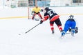 Young skater man in attack. Ice hockey game Royalty Free Stock Photo