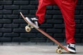 Young skater with skateboard have fun at children training class