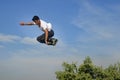 Young skaters under the blue sky seems almost like flying