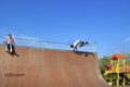 Young skaters under the blue sky seems almost like flying