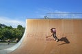 Young skaters under the blue sky seems almost like flying