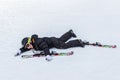 Young skier tiered on the slope