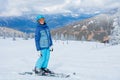 Young skier in winter resort Royalty Free Stock Photo