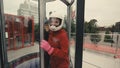 Young skydiver woman getting ready for flight in wind tunnel