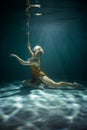 Young Slender Girl Underwater. Water Magic. Underwater Photography. Art Royalty Free Stock Photo