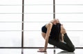 Young slim blond woman in yoga class making beautiful asana exercises. Royalty Free Stock Photo