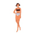 Young slim girl in bikini. Modern woman with tattoos on neck and leg, wearing beach wear, swimsuit. Female in beachwear
