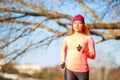 Young slim woman running in park in the morning Royalty Free Stock Photo