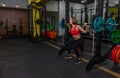 Sport woman training in modern gym. Healthy lifestyle Royalty Free Stock Photo