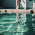 Young slim woman& x27;s legs near swimming pool in summer sun. Tropical vacation concept. empty space Generative ai Royalty Free Stock Photo