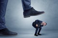 Trampled small businessman in suit Royalty Free Stock Photo