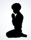 Little boy is praying. Vector drawing