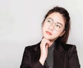 Young smart beautiful asian business woman wore black suit and glasses,smart and thinking holding Document, talking phone Royalty Free Stock Photo