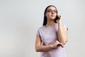 Young smart girl politely communicates on cell phone. Royalty Free Stock Photo