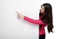 Young smile woman pointing at a blank board Royalty Free Stock Photo