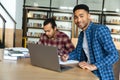 Young smiling african male student using laptop for a study Royalty Free Stock Photo