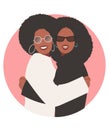 Young smiling Afro American women hugging happily, wearing trendy glasses and 70s hair style