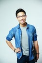 Young smiling asian man holding laptop Royalty Free Stock Photo