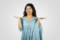 Young Smiling Asian Nepali Indian Housewife giving several best gestures and poses with greeting Royalty Free Stock Photo