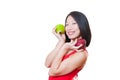 Young smiling asian woman red dress with apples on hands Royalty Free Stock Photo