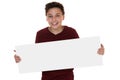 Young smiling boy holding an empty sign with copyspace Royalty Free Stock Photo