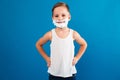 Young smiling boy in shaving foam like man Royalty Free Stock Photo