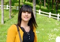 Young smiling brunette girl, outdoors Royalty Free Stock Photo