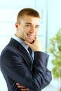 Young smiling business man standing Royalty Free Stock Photo