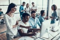 Young Smiling Business People Working in Office Royalty Free Stock Photo