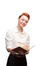 Young smiling business woman holding diary Royalty Free Stock Photo