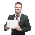 Young smiling businessman holding sign Royalty Free Stock Photo