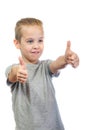 Young smiling caucasian boy shows thumbs up Royalty Free Stock Photo