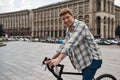 Young smiling caucasian man standing with bicycle Royalty Free Stock Photo