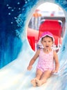 Young smiling child having fun in aquapark Royalty Free Stock Photo