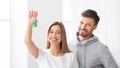 Young smiling couple feeling happy about buying a new house Royalty Free Stock Photo