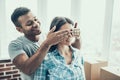 Young Smiling Couple Having Fun Moving in New Home Royalty Free Stock Photo