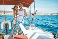 Young couple on a sailing boat -Romantic vacation and luxury travel Royalty Free Stock Photo