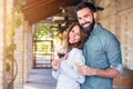 Young smiling couple tasting wine at winery outdoors Royalty Free Stock Photo