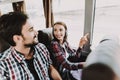 Young Smiling Couple Traveling on Tourist Bus Royalty Free Stock Photo