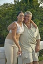 Young smiling Cuban girl and man with hat posing for camera in the Valle de ViÃ¯Â¿Â½ales, in central Cuba