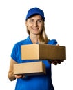 Smiling delivery woman in blue uniform giving cardboard package. isolated on white background