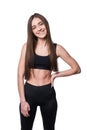 Young smiling fitness-girl in sport style isolated on white background. Healthy lifestyle concept. Royalty Free Stock Photo