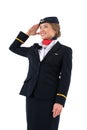 Young smiling flight attendant saluting Royalty Free Stock Photo