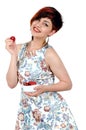 Young smiling girl eating strawberries. Royalty Free Stock Photo