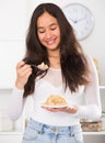 Girl eating useful mixture of cereals