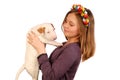 Young Smiling Girl Embraces White Bullterrier Puppy Royalty Free Stock Photo